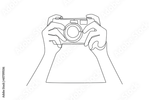 Single one line drawing  Photographer with camera. World photography day concept. Continuous line draw design graphic vector illustration.