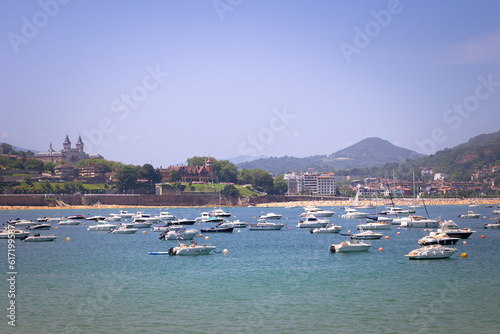 ships moored in the bay with the mountain in the background in Spain