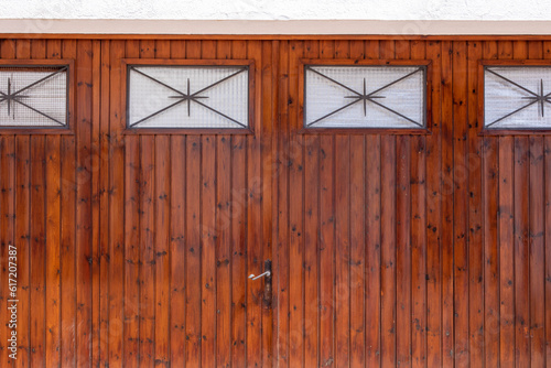 reddish brown garage door in a house