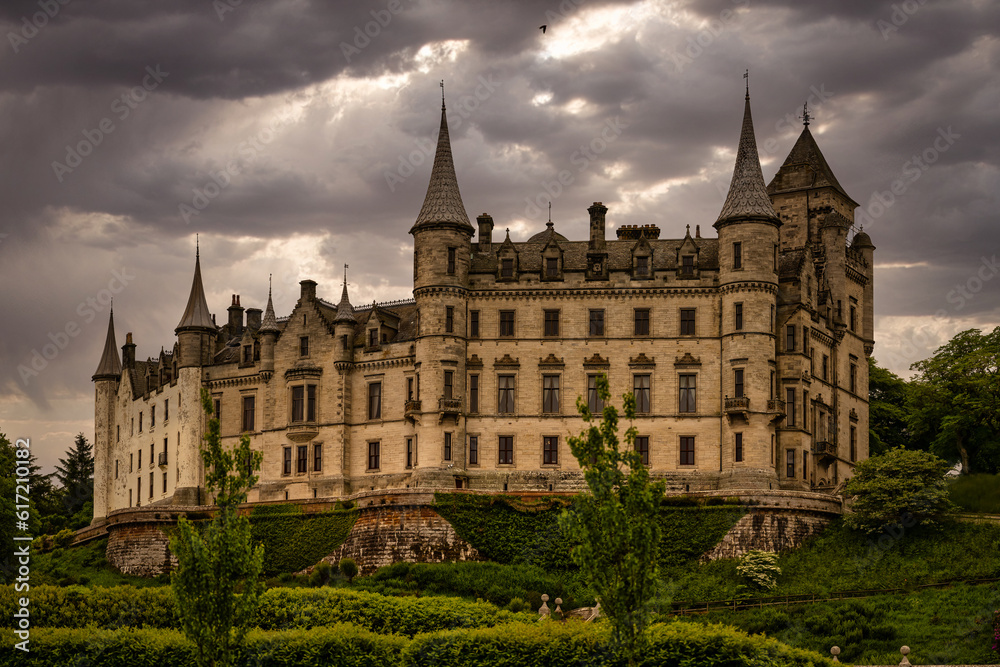 2023-06-05 BACK OF THE DUNROBIN CASTLE IN SUTHERLAND SCOTLAND WITH DARK STORM CLOUDS MOVING IN