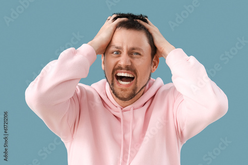 Young man having panic atta...