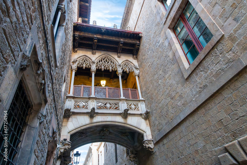 The Pont del Bisbe (Bishop Street Bridge), a Gothic bridge built in 1928 connecting the House of Canons with the Palau de la Generalitat in the Gothic Quarter of Barcelona, Spain. photo