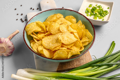 Crispy potato chips in bowl...