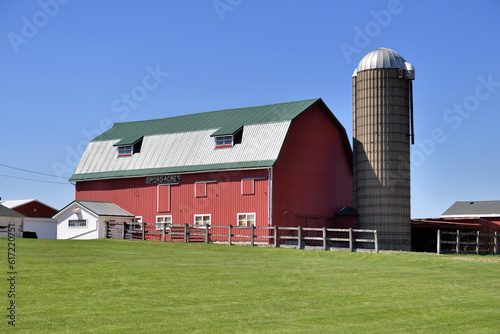 Late afternoon shadows begin to consume a barn in rural northeastern Illinois. The scene is representative of the solitude and serenity of the agricultural Midwestern United States.