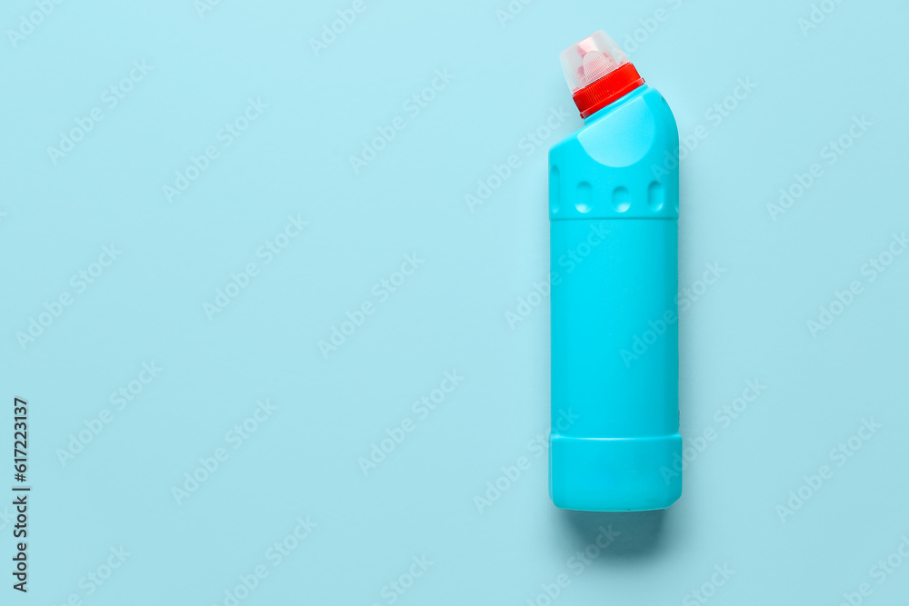 Bottle of detergent on blue background Bottle of detergent on blue background