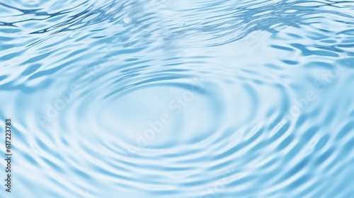 Abstract blue water background with wavy circles.