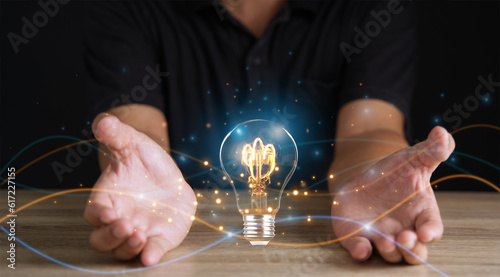 Creative solution or idea for web banner design or landing page template for creative agency with hands coming out of the screen with light bulbs and colorful abstract geometric shapes and lead lines.