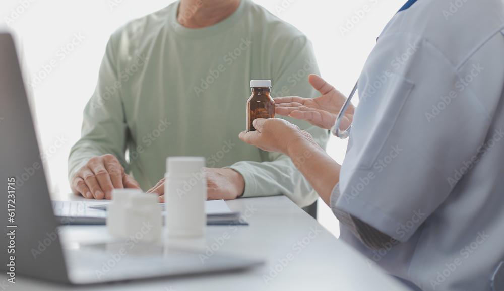 Young doctor visiting elderly woman at home Young doctor visiting elderly woman at home