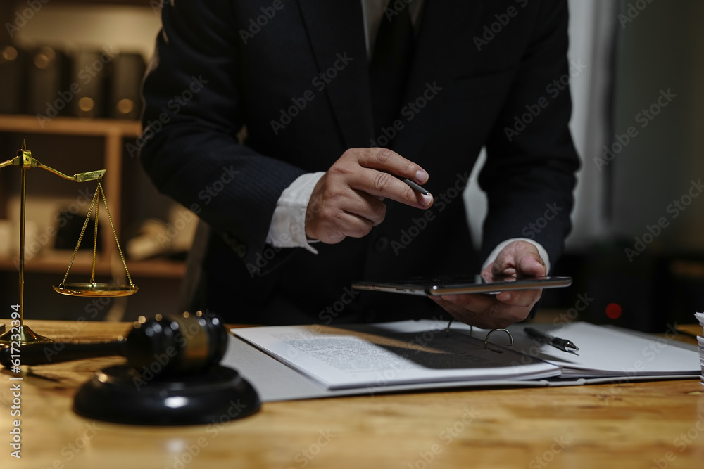 Lawyer Business Lawyer working on Legal matters at the office.