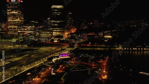 City skyline with lakefront view at night - 4K - 5