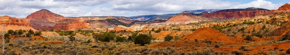 Scenic panorama landscape view of Utah State Route 24 near Torrey, Utah. Selective focus, background blur and foreground blur. 

