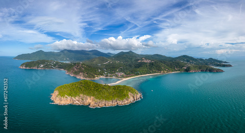 Koh Phangan, Thailand: Dramatic aerial panorama of the Mae Haad beach in the Ko Pha Ngan island in the gulf of Thailand in Southeast Asia.