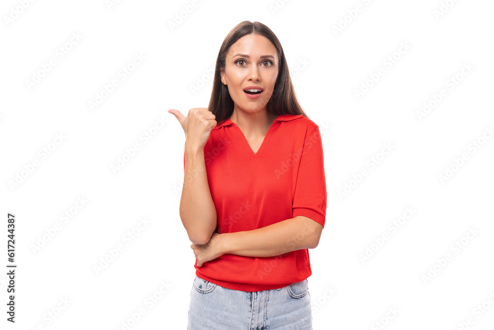surprised brunette woman in a red stylish v-neck blouse shows her hand to the empty space surprised brunette woman in a red stylish v-neck blouse shows her hand to the empty space