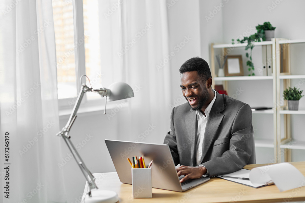 student man american office freelancer online job computer laptop education conference african