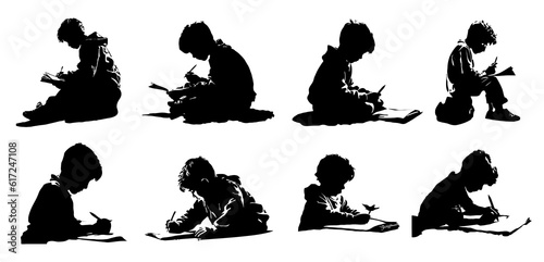 boy sitting writing or drawing silhouette set