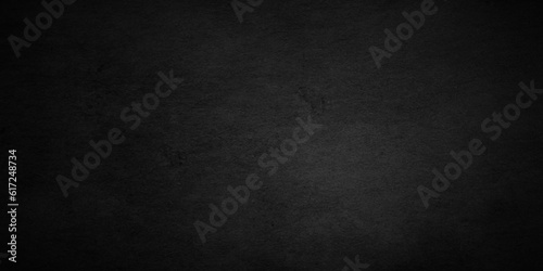 Black stone wall texture grunge rock surface. dark gray background backdrop. wide panoramic banner. old wall stone for dark black distressed grunge background wallpaper rough concrete wall.