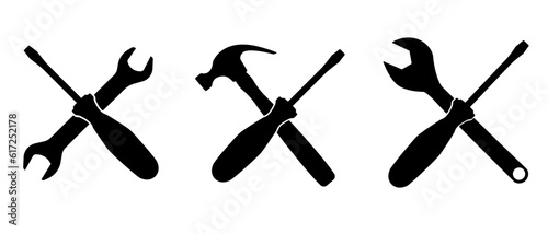 A set of tool icons symbolizing repair. Silhouette black.