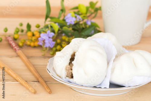 steamed dumpling fresh healthy foods with purple flowers arrangement flat lay styel on background wooden