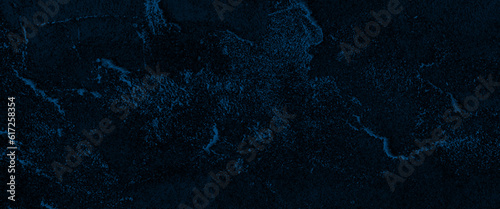 Natural blue slate stone background pattern with high resolution. Top view, copy space, dark blue rough grainy stone or concrete wall texture background.