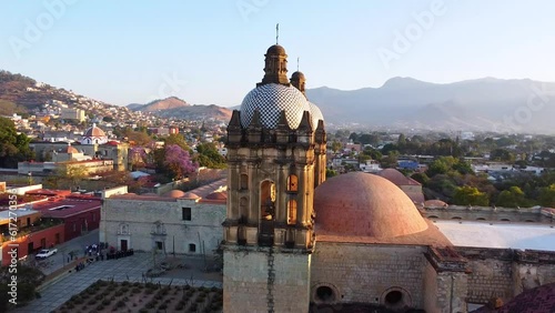 historical city 4k drone aerial video mexico summer travel america cultural cathedral with mountains in the background sunny day 