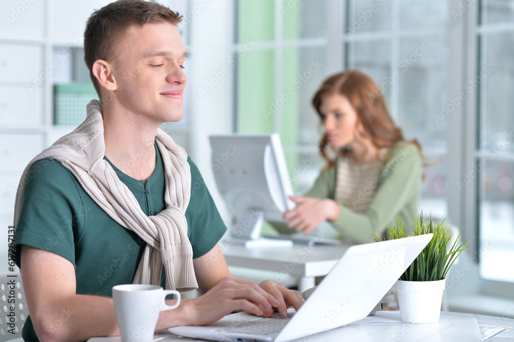 young people working in office