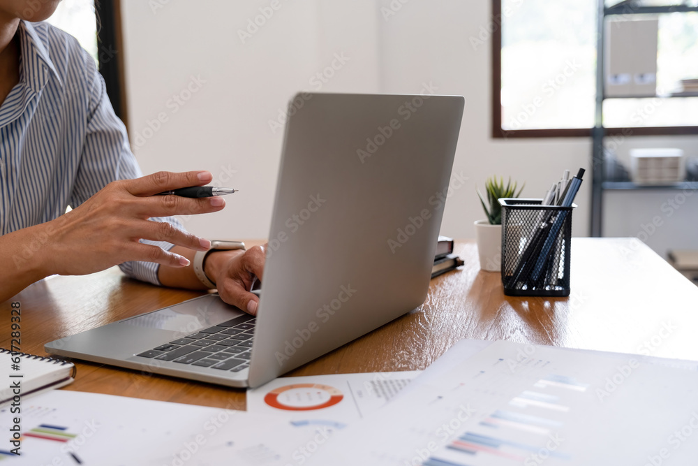 Busineswoman working on laptop. Busineswoman working on laptop.