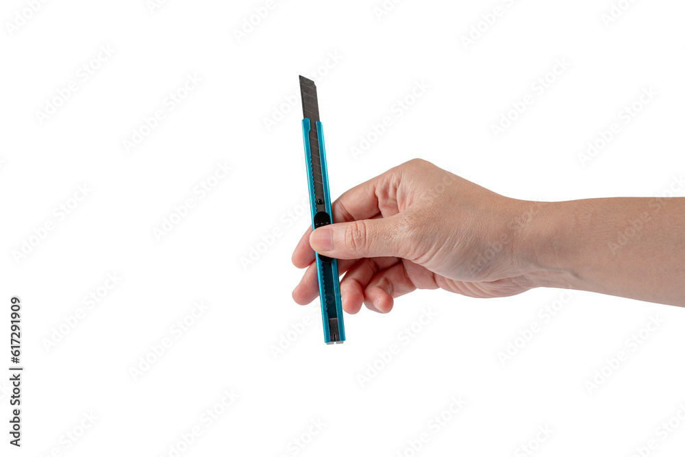 Cutter knife tool office for cutpaper in hand on transparent background Cutter knife tool office for cutpaper in hand on transparent background
