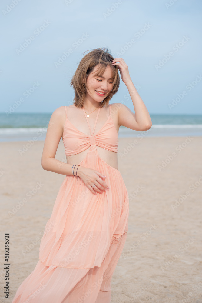 young slim beautiful woman on sunset beach, playful, summer vacation, sunny, having fun, positive mood, romantic, traveller, happy, Happy mixed race girl in casual outfit with wind in her hair. young slim beautiful woman on sunset beach, playful, summer vacation, sunny, having fun, positive mood, romantic, traveller, happy, Happy mixed race girl in casual outfit with wind in her hair.