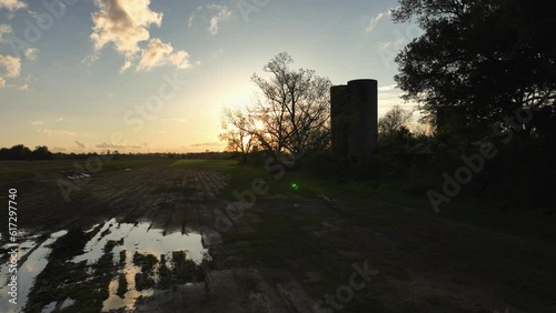 Sunset over a farm in Alabama reveal
 photo