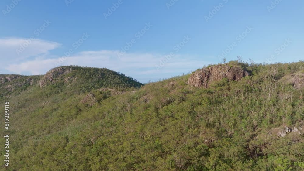 Rocky Mountain Top Surrounded By Green Forest In Australian Countryside Landscape, 4K Drone View Rocky Mountain Top Surrounded By Green Forest In Australian Countryside Landscape, 4K Drone View