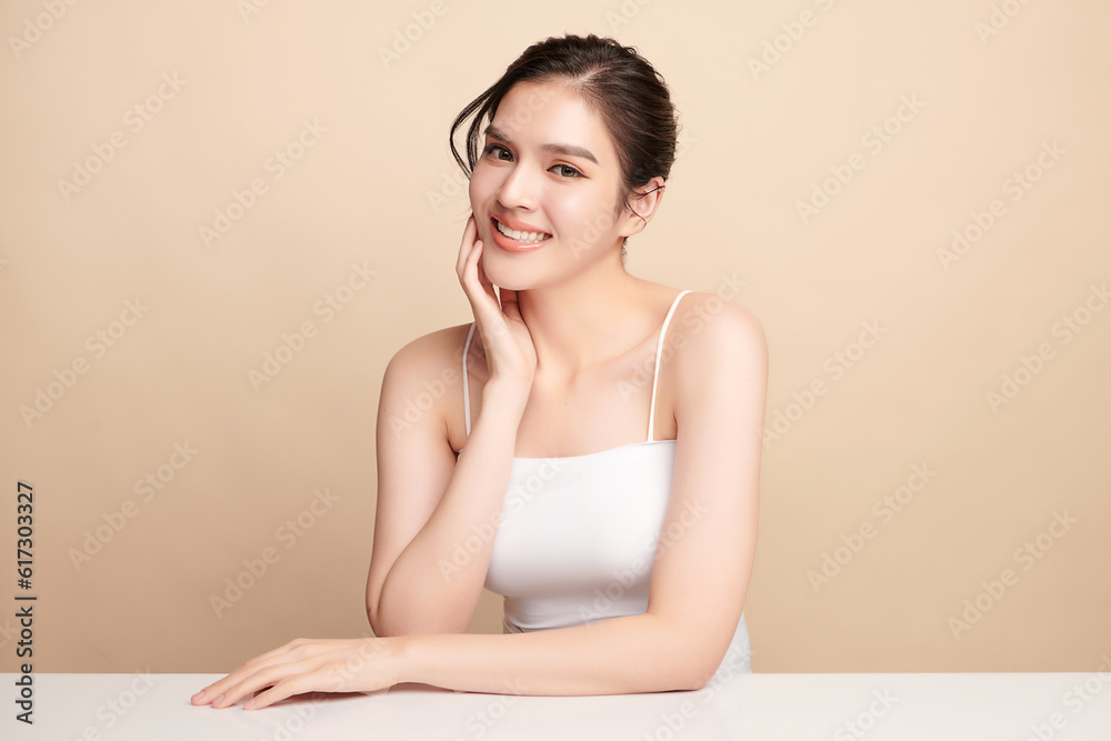 Beautiful young asian woman with clean fresh skin on beige background, Face care, Facial treatment, Cosmetology, beauty and spa, Asian women portrait. Beautiful young asian woman with clean fresh skin on beige background, Face care, Facial treatment, Cosmetology, beauty and spa, Asian women portrait.