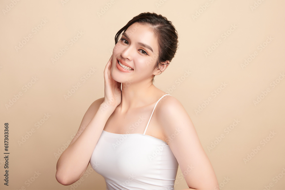 Beautiful young asian woman with clean fresh skin on beige background, Face care, Facial treatment, Cosmetology, beauty and spa, Asian women portrait. Beautiful young asian woman with clean fresh skin on beige background, Face care, Facial treatment, Cosmetology, beauty and spa, Asian women portrait.