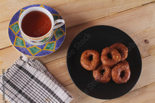 Ali agrem cake is a traditional Sundanese food originating from Karawang, which at first glance looks similar to a donut because it is round and has a hole in the middle. 
 photo