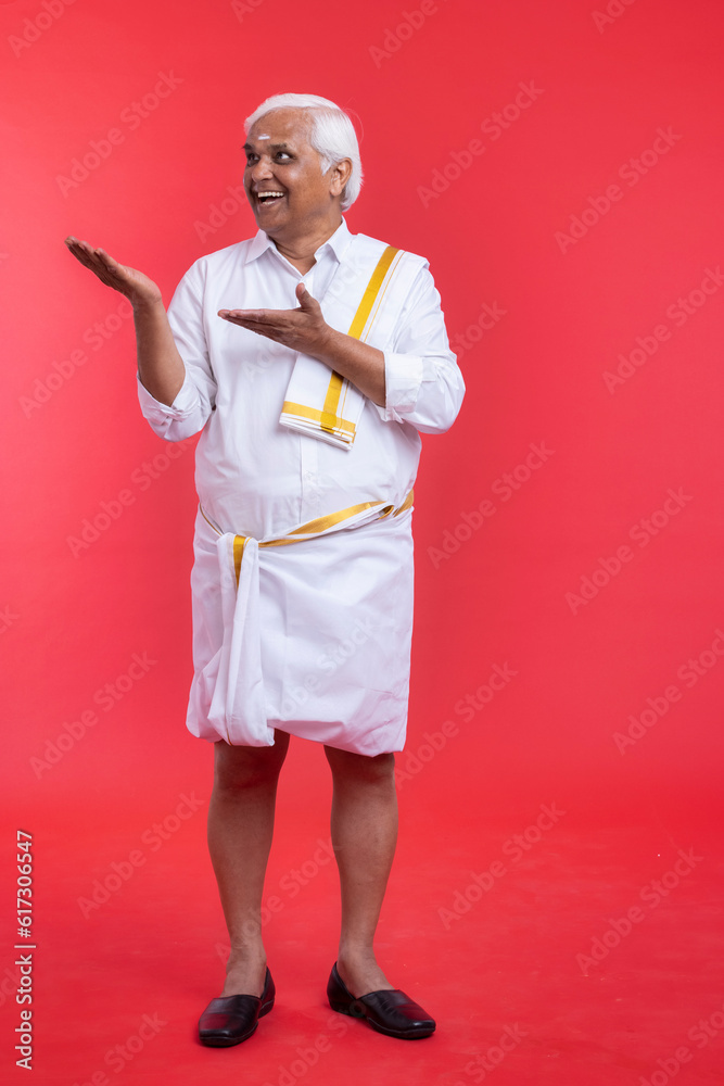 Happy senior man in traditional south Indian clothing Happy senior man in traditional south Indian clothing