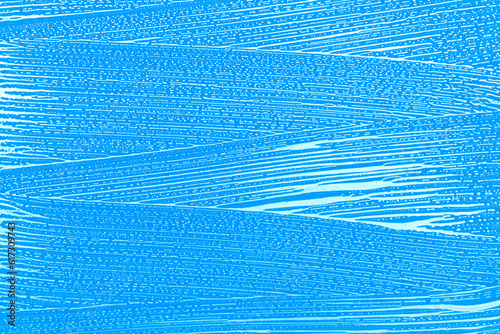 soap foam wipe marks on window glass, sky blue background, wash and clean windows