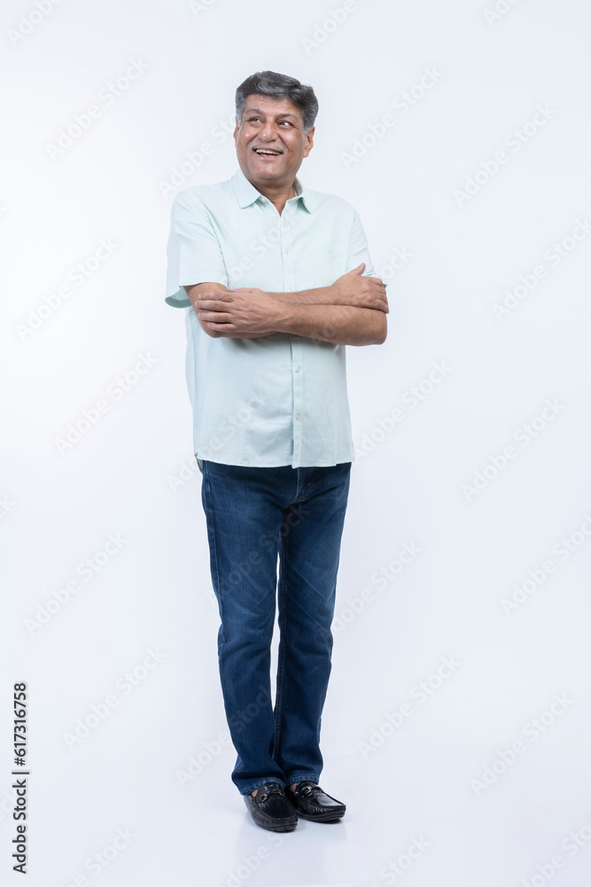 Portrait of happy senior man with arms crossed Portrait of happy senior man with arms crossed