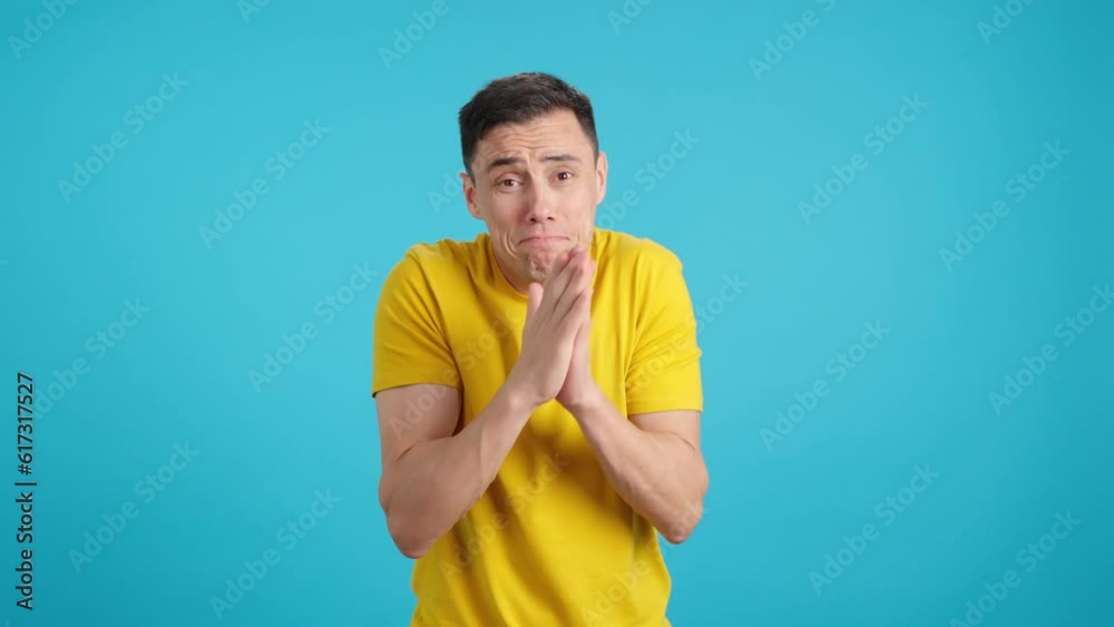 Man gesturising a small amount with his fingers Man gesturising a small amount with his fingers