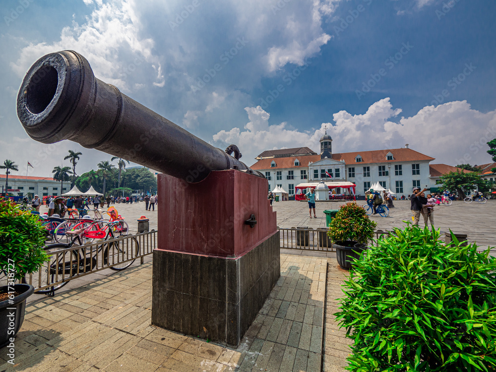 Jakarta, Indonesia (March 19, 2023): The Si Jagur cannon is an ancient cannon left by the Portuguese in the old city area which is one of the historical evidences of colonial warfare.