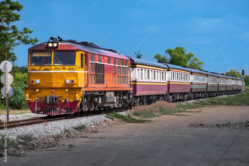 Passenger train by diesel locomotive on the railway. Passenger train by diesel locomotive on the railway.