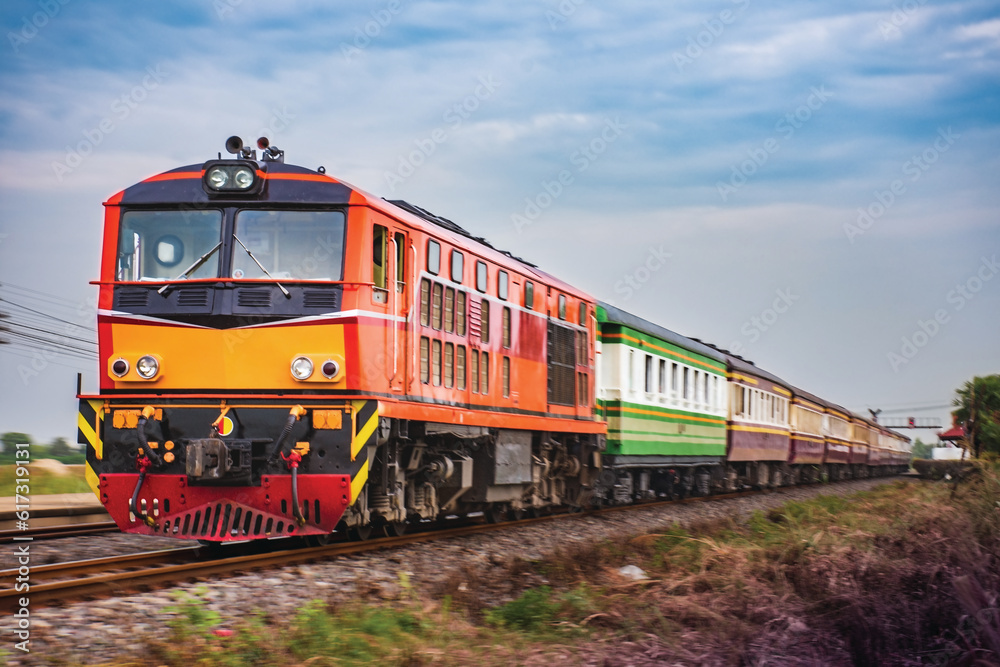 Passenger train by diesel locomotive on the railway. Passenger train by diesel locomotive on the railway.