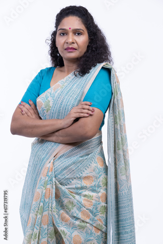 Photography Indian woman standing in saree on a white background.