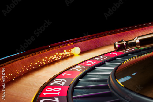 Obraz na płótnie Presentation of a luxury casino roulette wheel with a yellow spinning fireball. w salonie