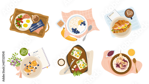 Breakfast meal top view set. Milk porridge with fruits and berries. Fried eggs with meat and vegetables, bacon, toast with salad. Cartoon flat vector collection isolated on white background