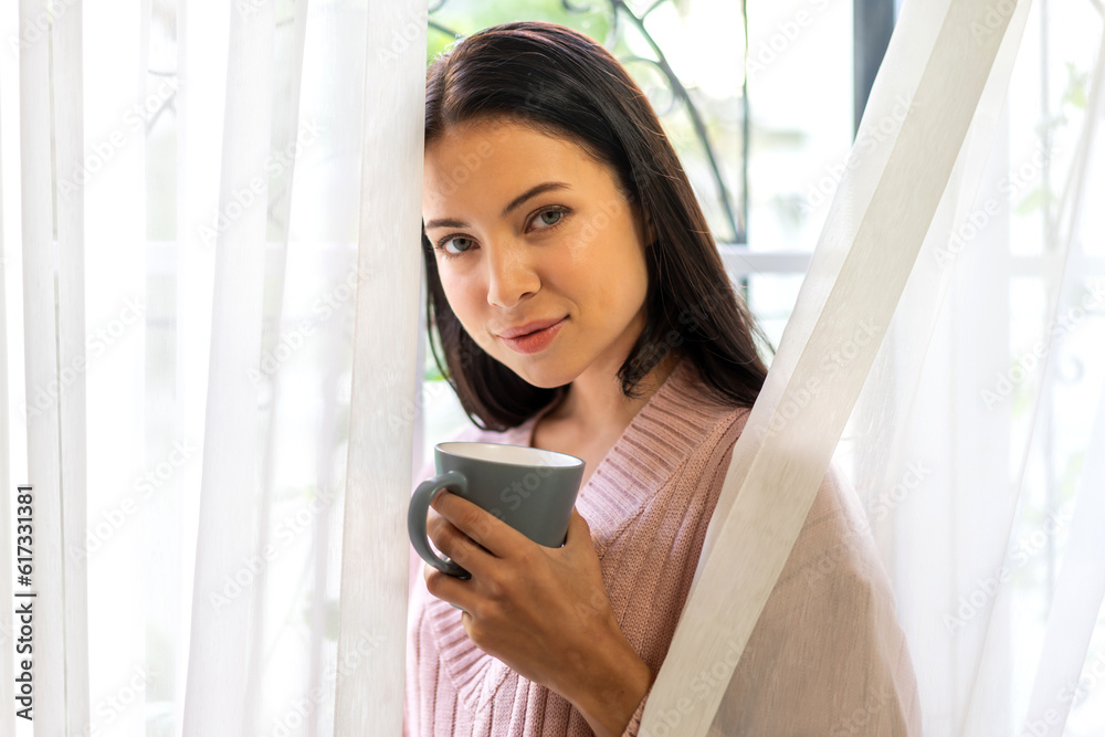 Portrait of smiling happy enjoy beauty woman relax drinking cup of hot coffee or tea,Cappuccino,Espresso,Americano,Latte.Girl felling enjoy breakfast in holiday morning vacation on bed at home Portrait of smiling happy enjoy beauty woman relax drinking cup of hot coffee or tea,Cappuccino,Espresso,Americano,Latte.Girl felling enjoy breakfast in holiday morning vacation on bed at home