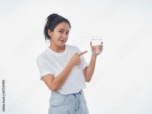 Woman drinking water on white background