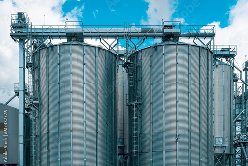 Front view of steel grain storage silos © graja