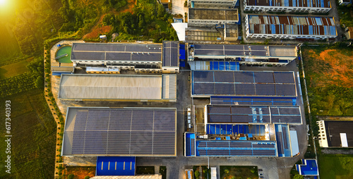 Aerial photography of solar photovoltaic panels built on the roof of a factory building