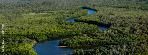 Aerial photo on a flight over Cape York from Cooktown to the tip of Australia. Crocodile country with very winding river and green bushland. Queensland, Australia