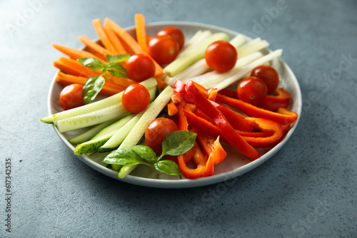 Raw vegetable platter with fresh basil