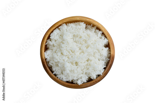 Isolated, cooked rice in wooden bowl photo